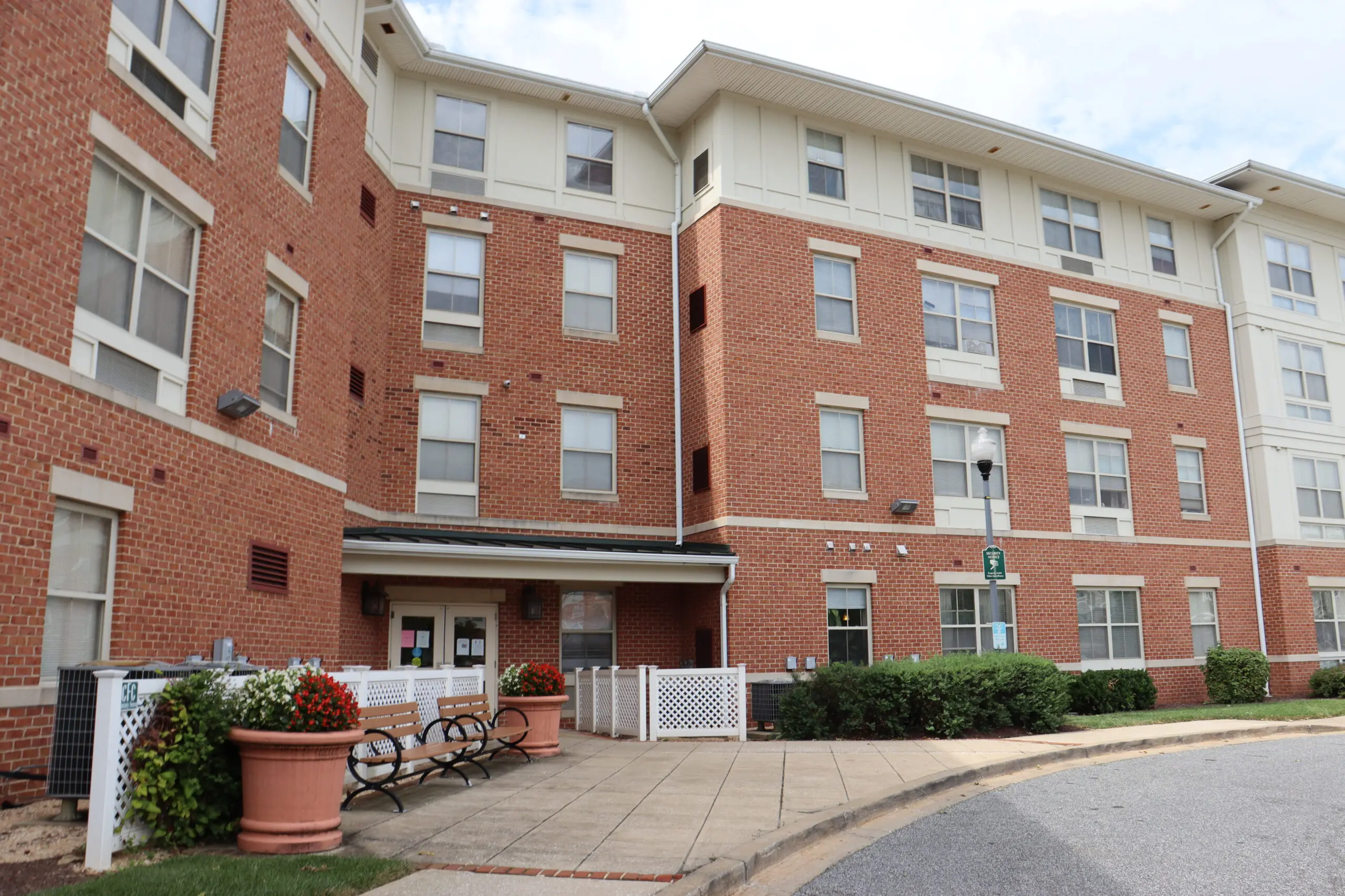 A building with many windows and a bike rack.